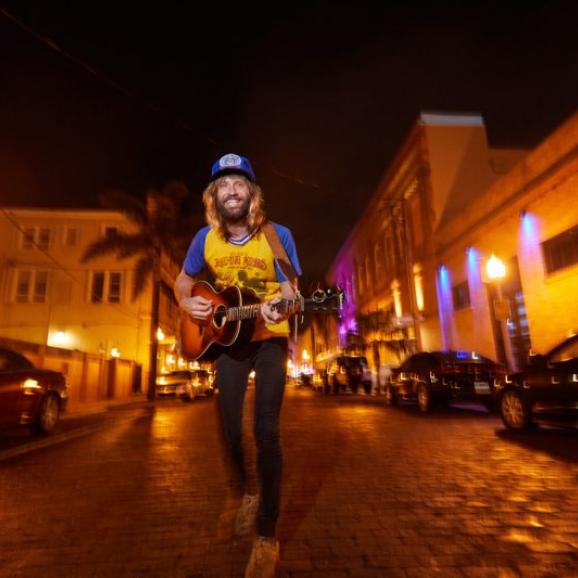 Paul McDonald in Downtown Fort Myers Street with Guitar